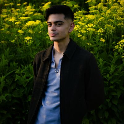 Erick Aguilar with field of flowers in background